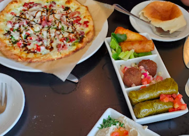 Sitti signature dishes Warak Anab
Kibbee Mikli
Halloumi & Citrus